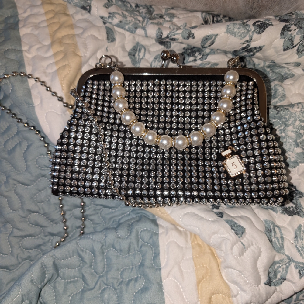 Elegant Black and Silver Clutch with Pearl Accents